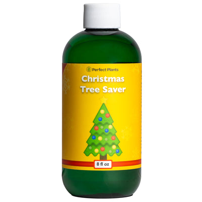 Bottle of Christmas Tree Saver with a yellow label featuring a Christmas tree graphic on a white background.