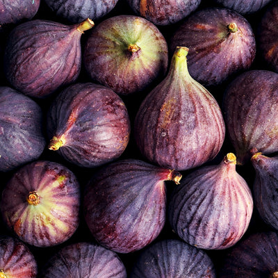 Flat lay close-up of purple LSU figs with a focus on texture and color.